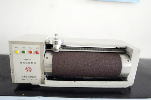 Roller type abrasion machine